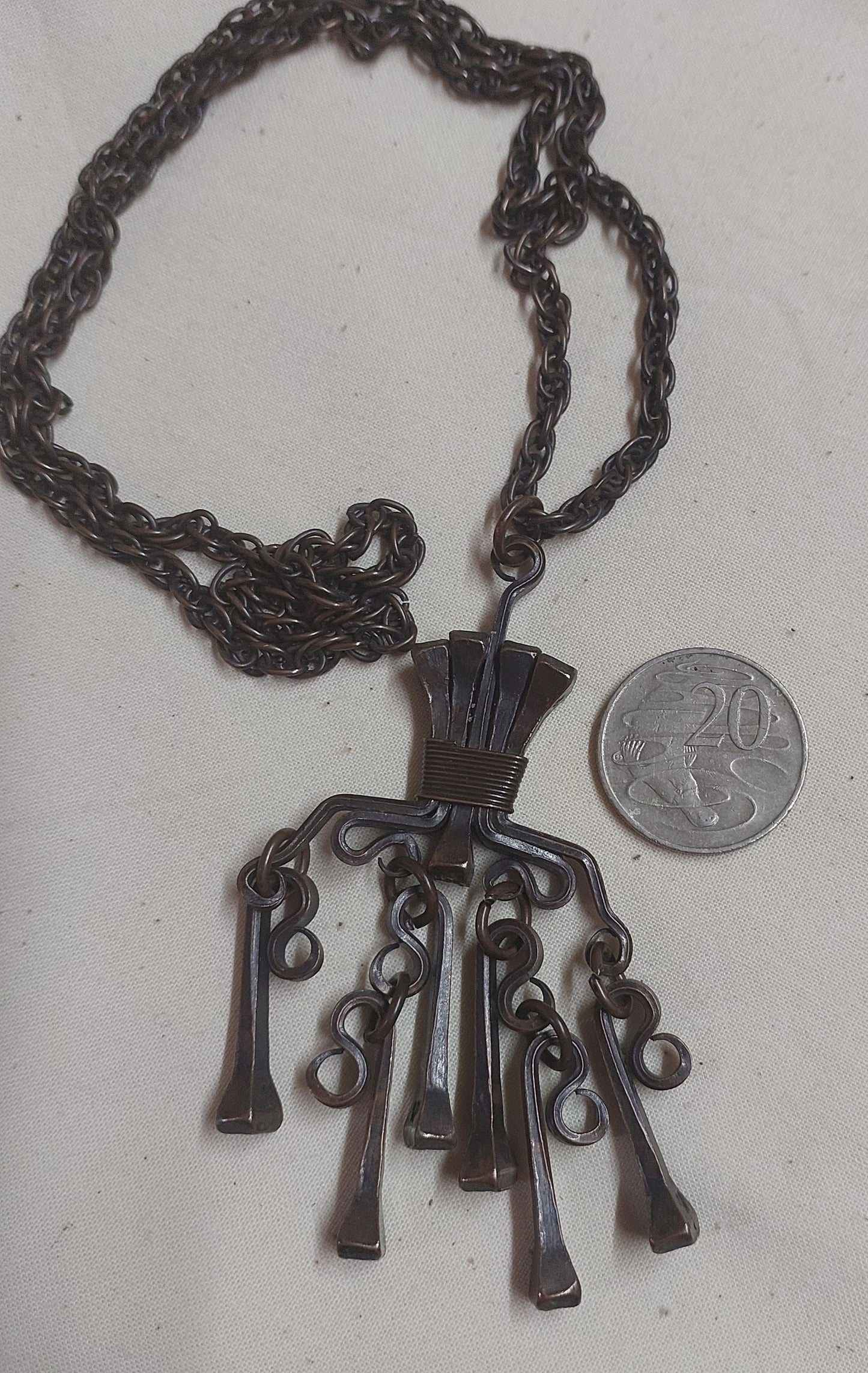 Hand-Forged Artisan Necklace – Sculptural Nail Tassel Statement Piece